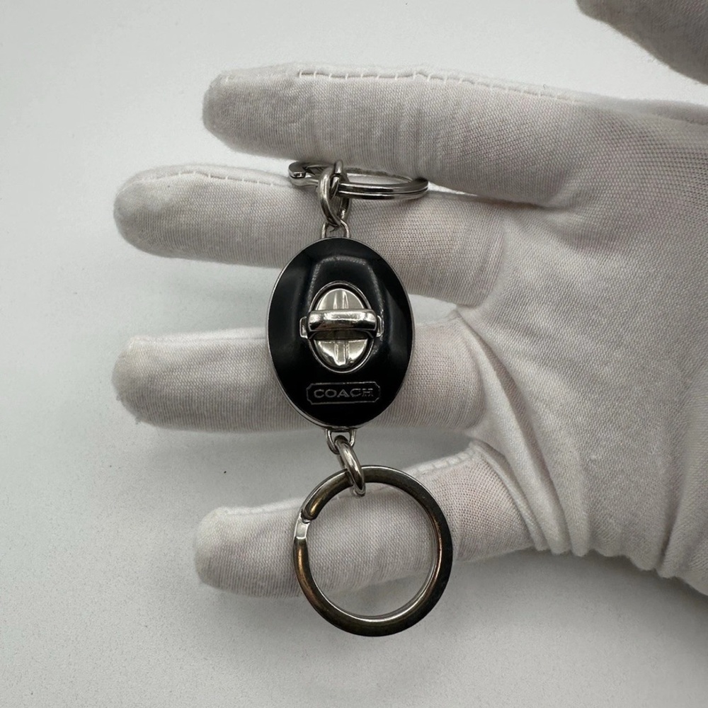 Coach Black and Silver turn lock  Keychain/ purse charm vintage and rare